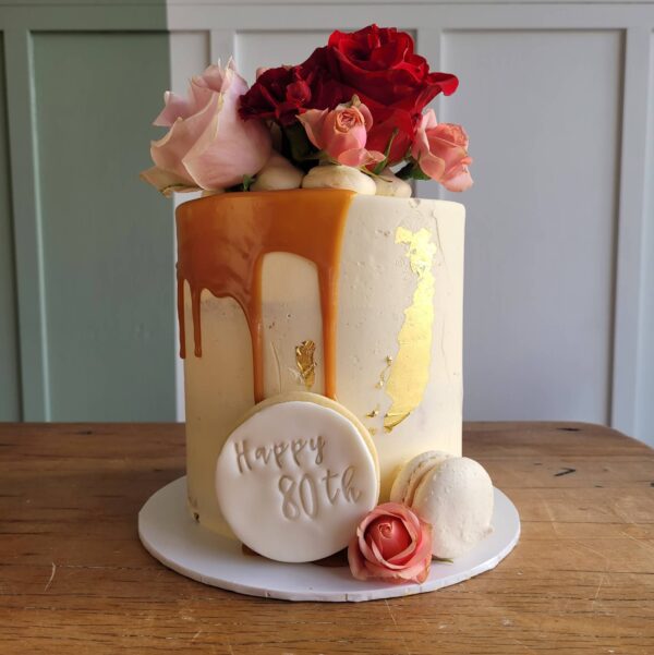 6x6 Semi naked cake, caramel drip, macaron and florals, The Cake Eating co, Christchurch